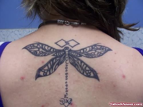 Tribal Dragonfly Tattoo On Back Body