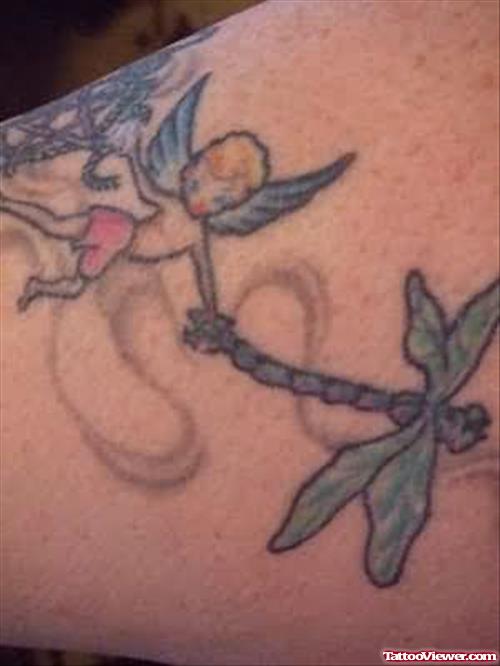 Flying Fairy and Dragonfly Tattoo On the Arm