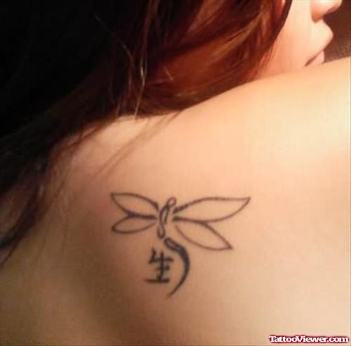 Dragonfly Tattoo On The Back