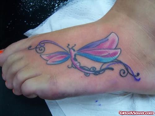 Coloured Dragonfly Tattoo On Foot