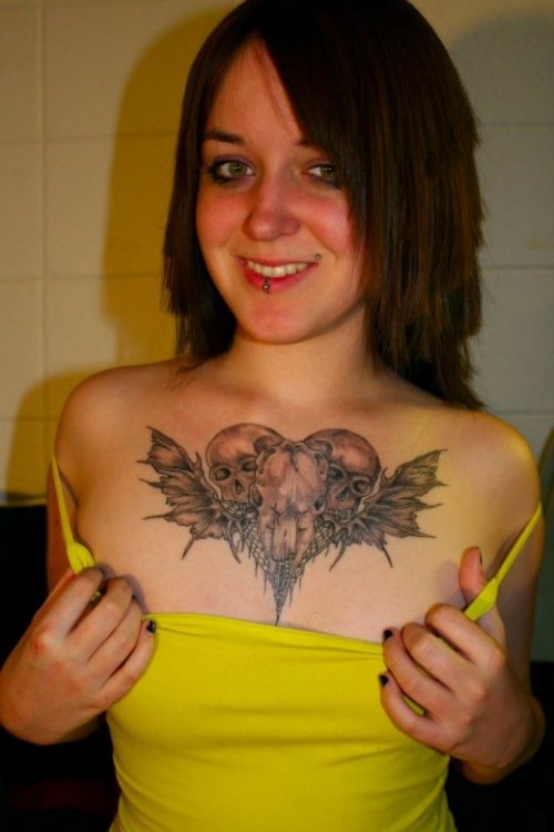 Grey Ink Heart By Duck Skulls Tattoo On Chest