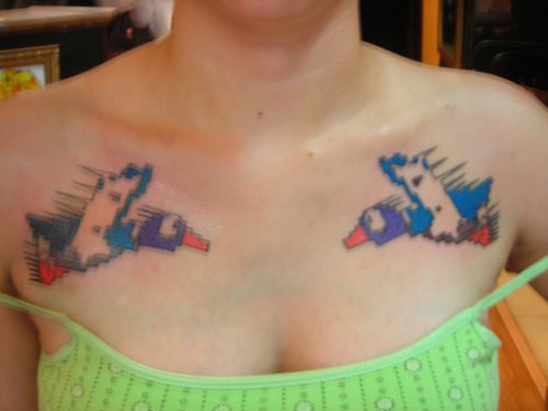 Duck Hunt Animation Tattoo On Girl Chest