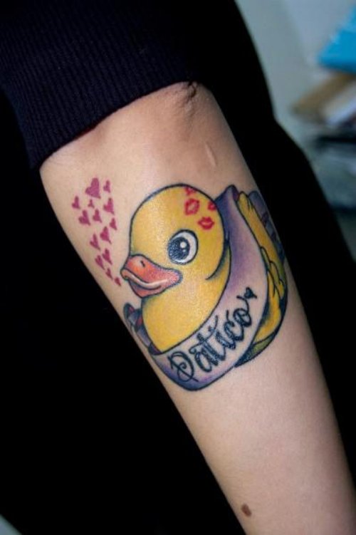 Rubber Duck And Patico Banner Tattoo On Arm