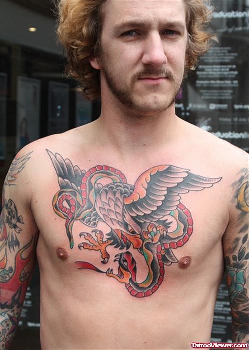 Man With Colored Eagle And Snake Tattoo On Chest