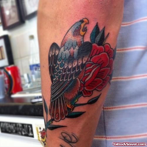 Red Rose And Eagle Tattoo On Arm
