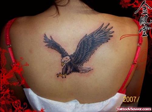 Landing Eagle Tattoo On Girl Back