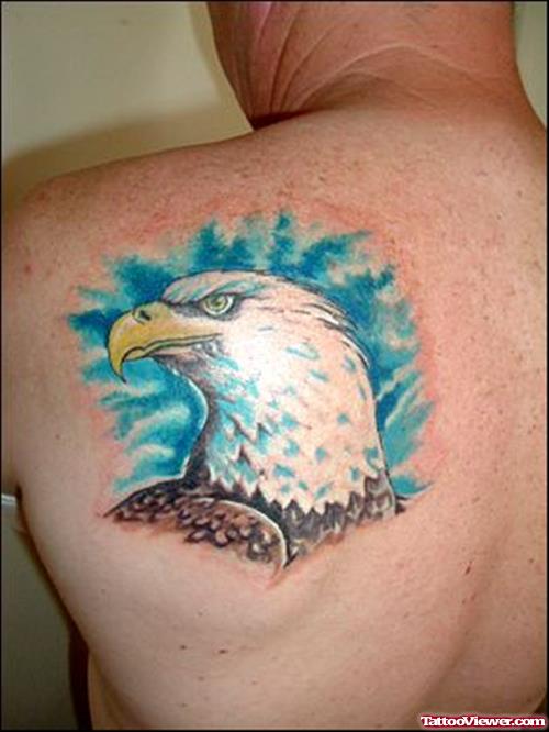 Blue Ink Eagle Head Tattoo On Back Shoulder