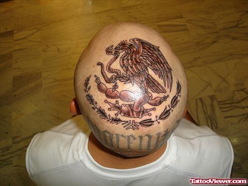 Brown Ink Eagle Tattoo On Man Head