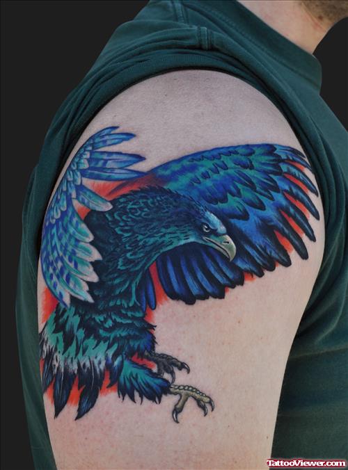 Flying Blue Ink Eagle Tattoo On Shoulder