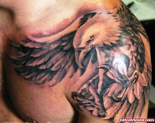 Grey Ink Flying Eagle Tattoo On Shoulder