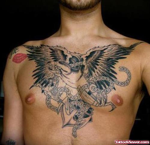 Grey Ink Flying Eagle And Chain With anchor Tattoo On Chest