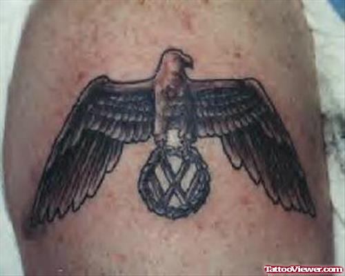 Eagle Sitting On Wolksvagon Logo Tattoo On Shoulder