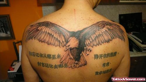 Chinese Symbols And Eagle Tattoo On Back