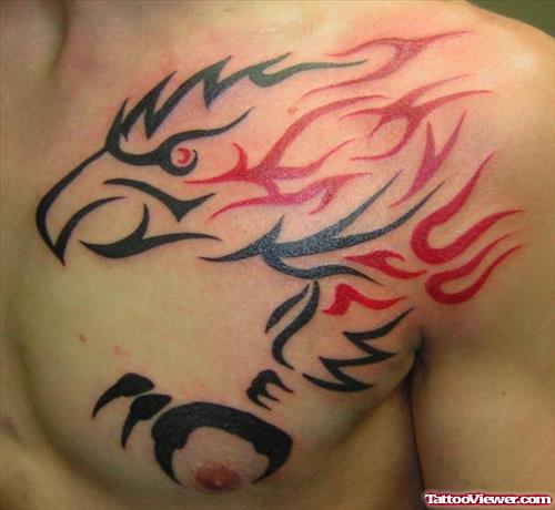 Black And Red Tribal Eagle Tattoo On Chest