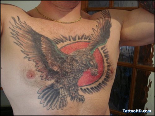 Sun And Eagle Tattoo On Man Chest