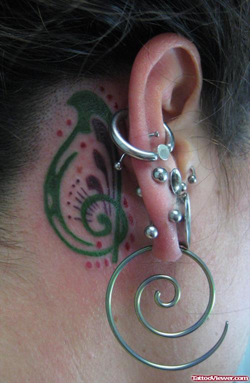 Green Behind Ear Tattoo