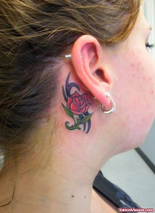 Tribal And Red Rose Ear Tattoo