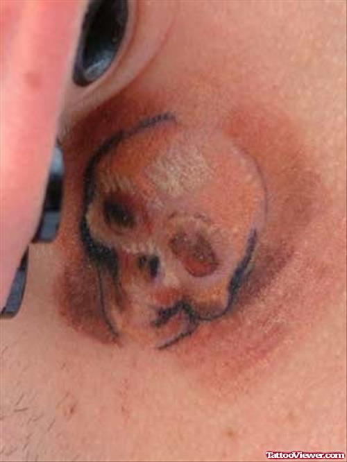 Small Skull Tattoo Behind Ear