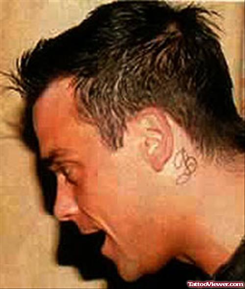 Robbie Williams Ear Tattoo