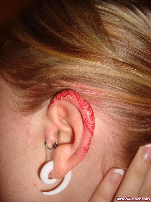 Red Ink Ear Tattoo For Girls