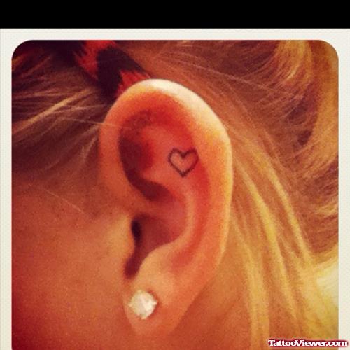 Outline Heart Left Ear Tattoo