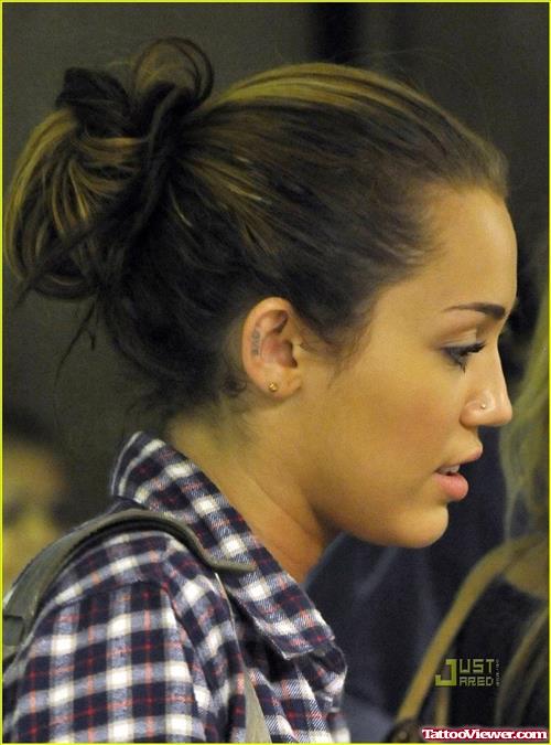 Love Miley Cyrus Ear Tattoo