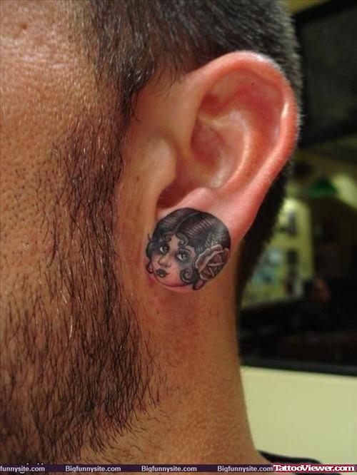 Girl Head Left Ear Tattoo