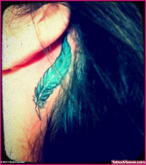Blue Feather Back Ear Tattoo