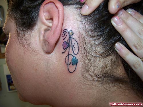 String Hearts Color Ink Ear Tattoo