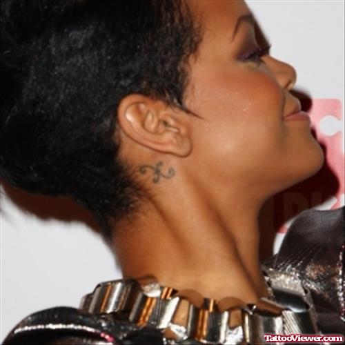 Rihanna Pisces Ear Tattoo