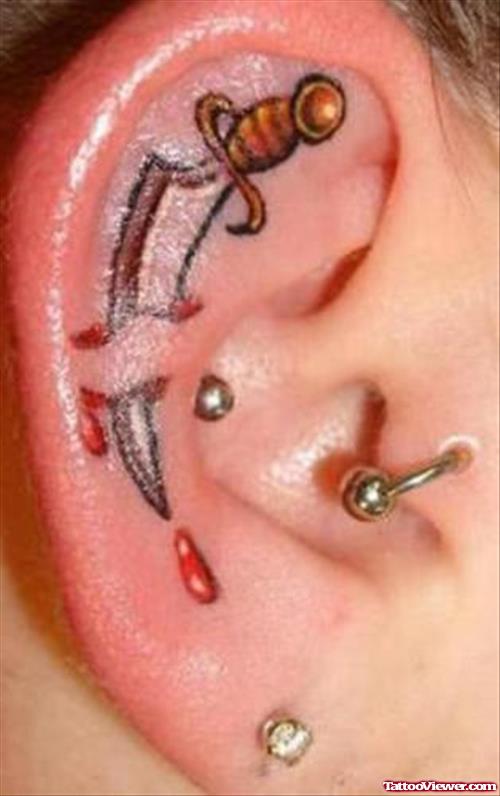 Dagger Ear Tattoo
