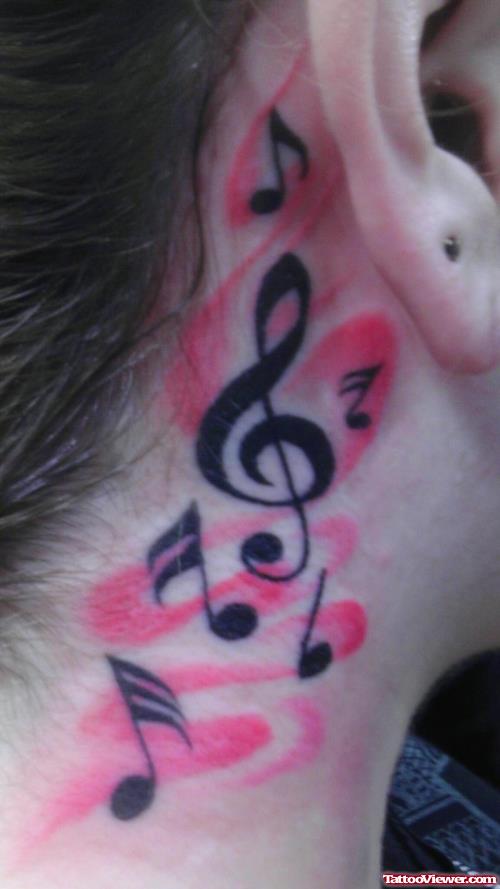 Awesome Musical And Godly Ear Tattoo