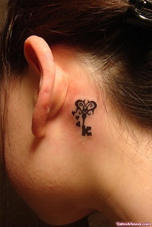 Tiny Heart And Key Back Ear Tattoo