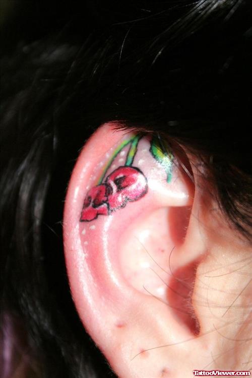 Red Ink Cherry Skull Ear Tattoos