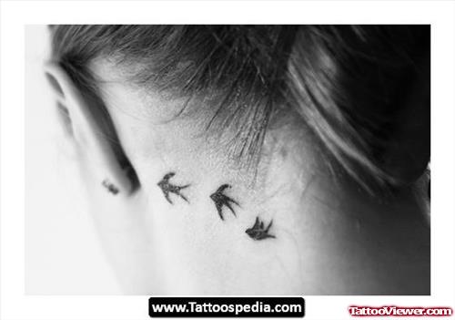 Flying Birds Ear Tattoo