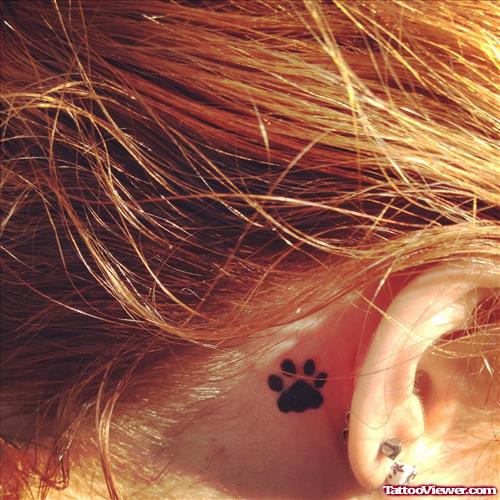 Black Paw Print Ear Tattoo