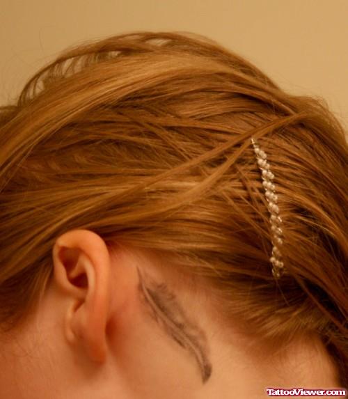 Awesome Grey Ink Feather Back Ear Tattoo