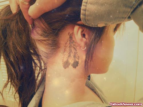 Grey Ink Feather Ear Back Tattoo