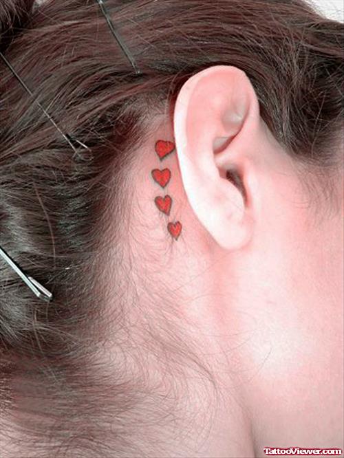 Tiny Red Hearts Behind Ear Tattoos