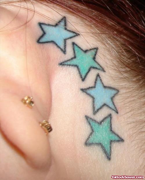 Blue Stars Behind Ear Tattoo