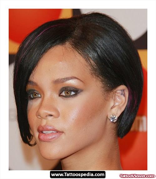 Star Tattoo In Rihanna Left Ear