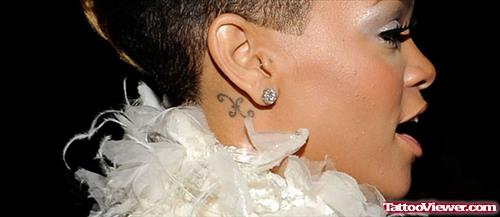 Rihanna Pisces Sign Tattoo Behind Right Ear