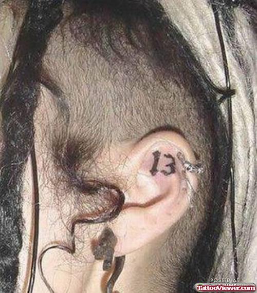 Number 13 Left Ear Tattoo