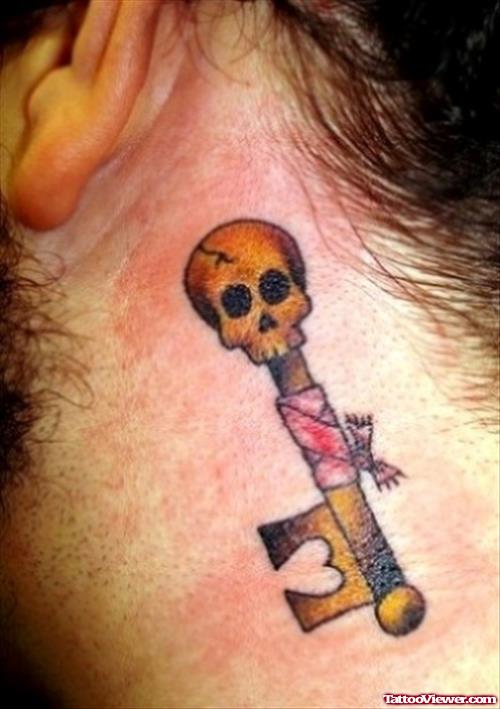 Skull Key Behind Ear Tattoo