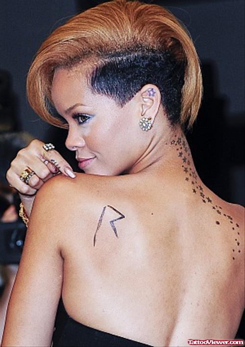 Rihanna Ear Tattoo