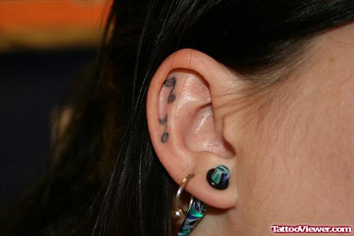 Music Notes Ear Tattoo