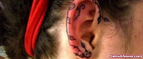 Girl Right Ear Tattoo