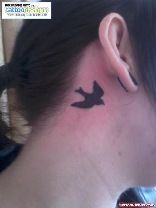 Flying Black Bird Ear Tattoo