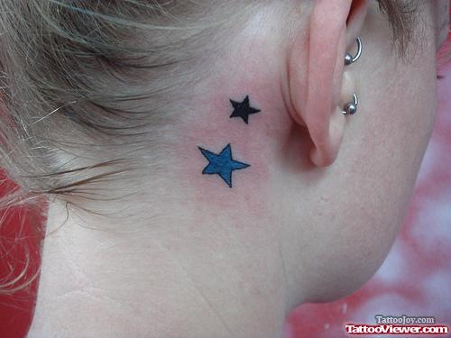 Black And Blue Star Ear Tattoo