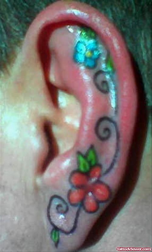 Red And Blue Flower Ear Tattoo